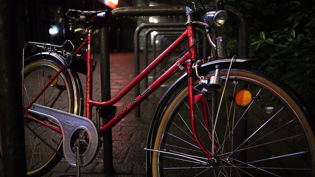 Red bicycle at night