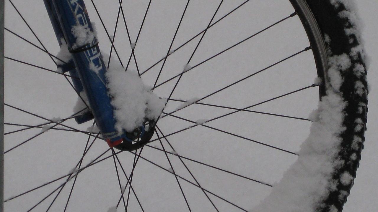 Bike wheel in snow