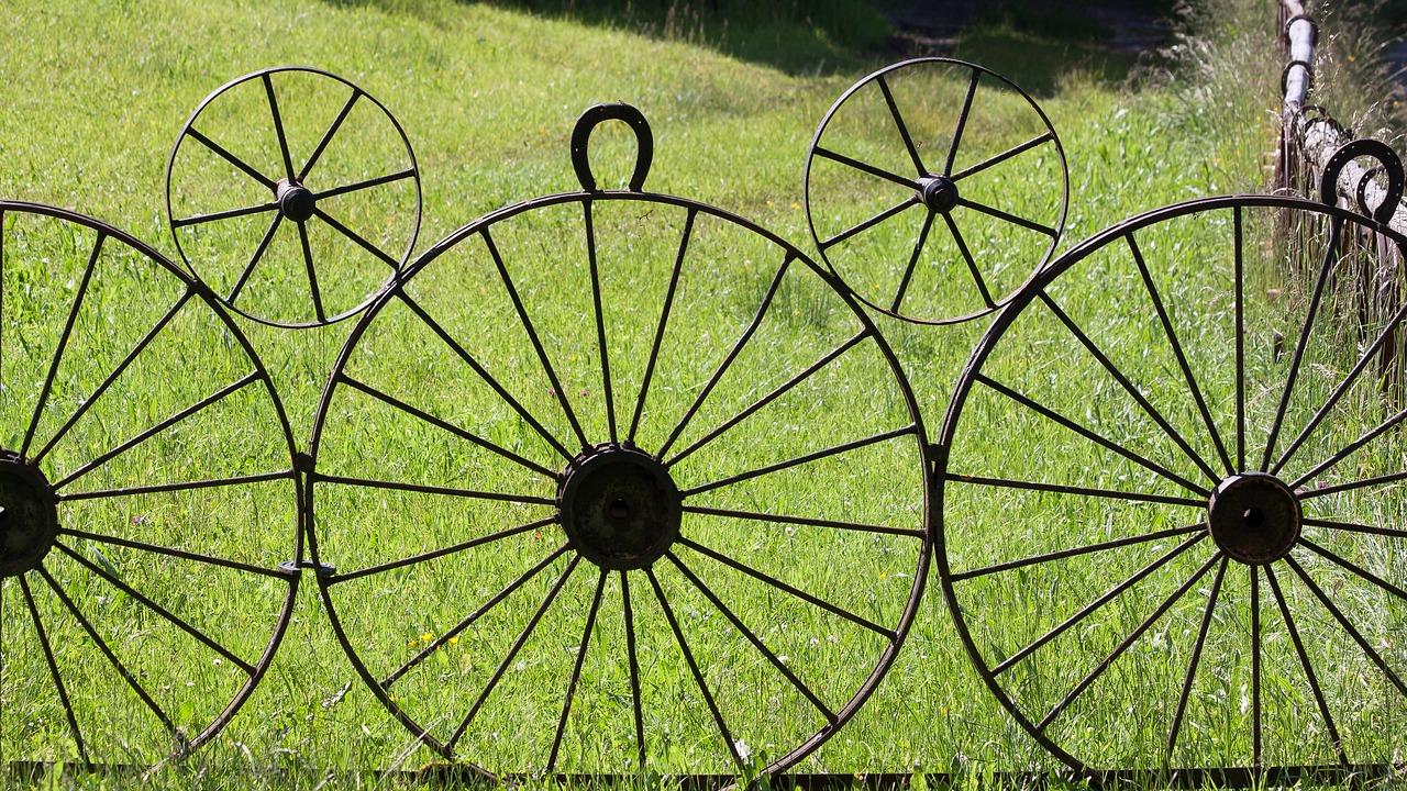 Iron wagon wheels in a field